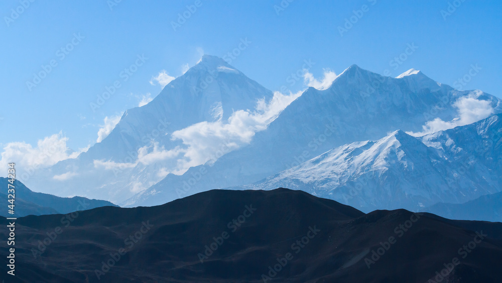 Misty mountains, morning in Himalayas, Nepal, Annapurna conservation area Misty mountains, morning in Himalayas, Nepal, Annapurna conservation area