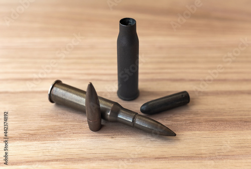 Rifle cartridges, bullets and spent cartridges