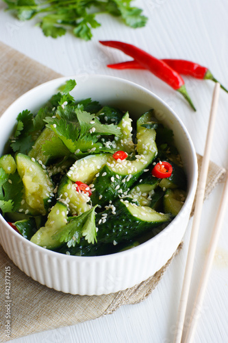 Broken cucumbers in Chinese. Crispy lightly salted cucumbers in Asian style.