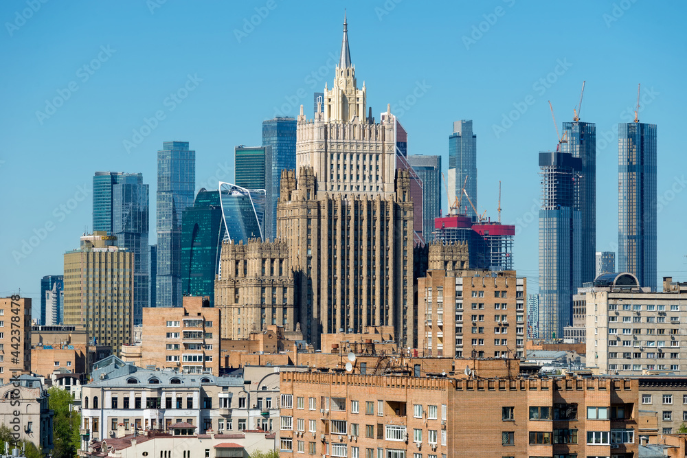 Naklejka premium View of the building of the Ministry of Foreign Affairs of the Russian Federation and the Moscow City business center on a sunny day. Famous tourist places. Moscow, Russia