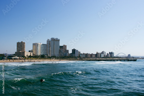 Ocean, coast and city skyline of Durban, South Africa. © Yaseen