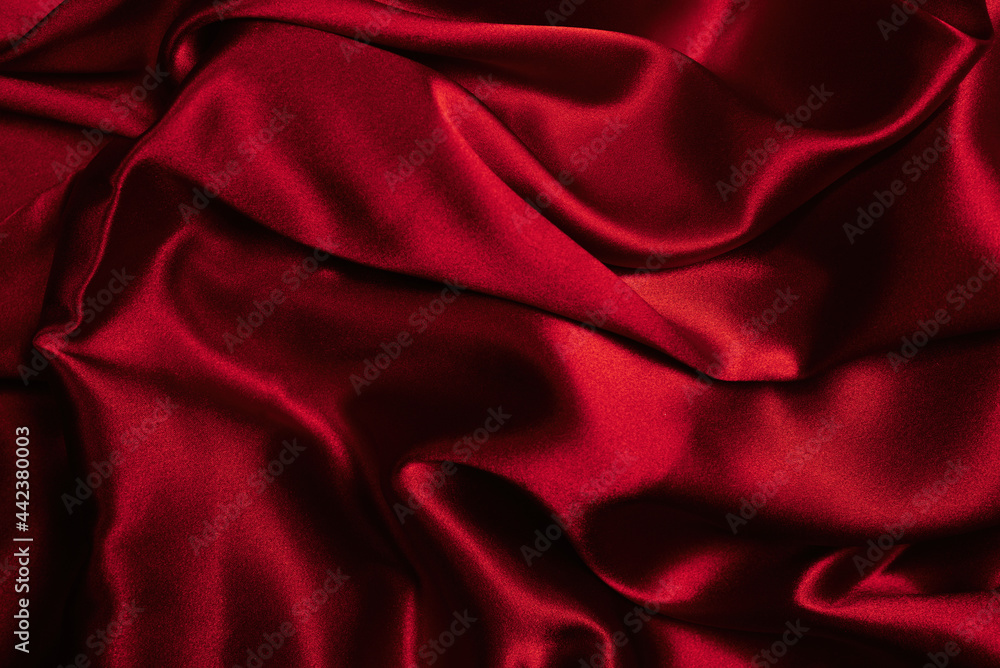 Rich and luxury red silk fabric texture background. Rich and luxury red silk fabric texture background.