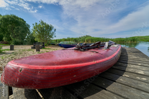 Photo Paddle board on the lake shore