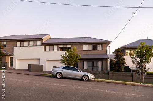 Grey car parked in front of home on sloping street in Adamstown Newcastle