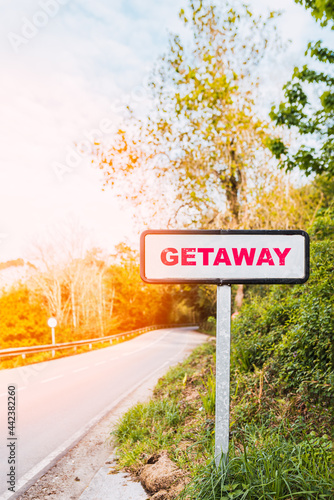 road sign with the word "getaway"