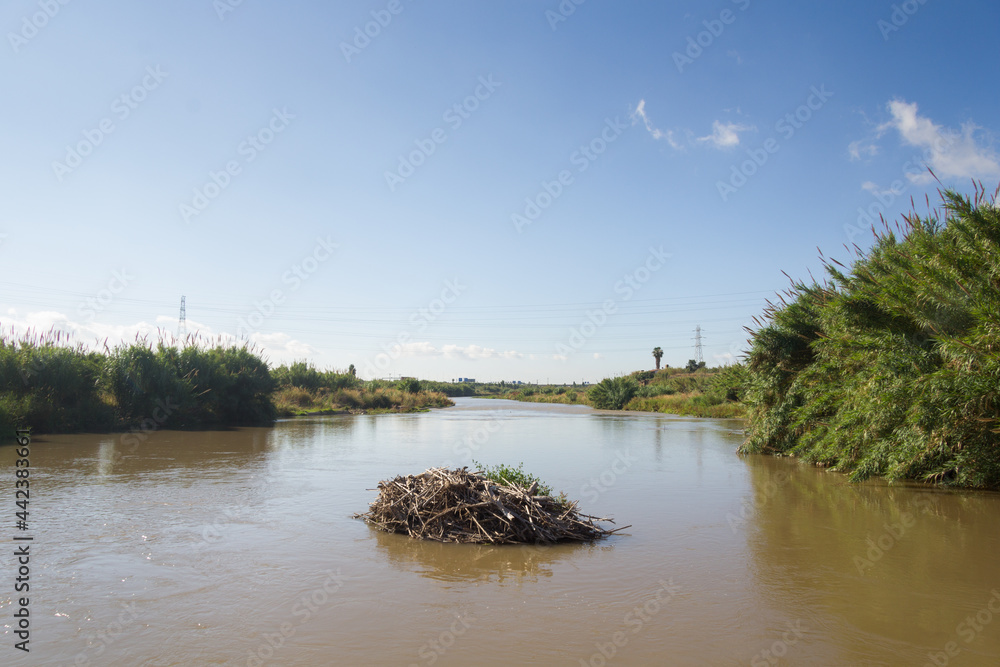 Obraz premium The Llobregat River as it passes through the Baix Llobregat region, near the city of Barcelona.