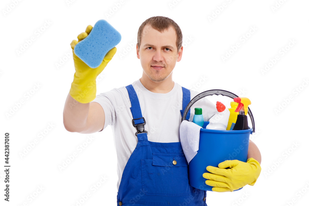portrait of male cleaner in blue uniform holding bucket with cleaning equipment and cleaning window isolated on white background portrait of male cleaner in blue uniform holding bucket with cleaning equipment and cleaning window isolated on white background