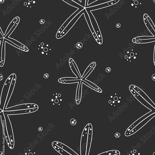 Seamless pattern with starfish in black and white color
