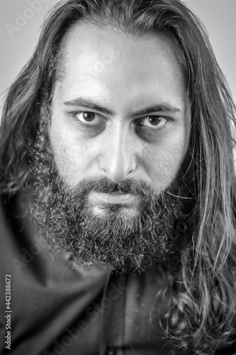 Cuadro en lienzo black and white portrait of a young middle eastern businessman with beard and lo