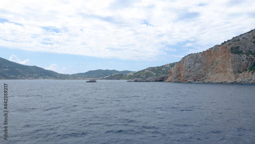 View of the mountains of an Aegean Island in Greece. Shooting from water.