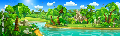 Rainforest landscape with a river running along sandy shores with thickets, tropical plants and palm trees.