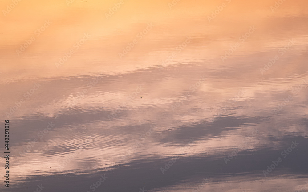 reflection of the sunset sky on the water reflection of the sunset sky on the water