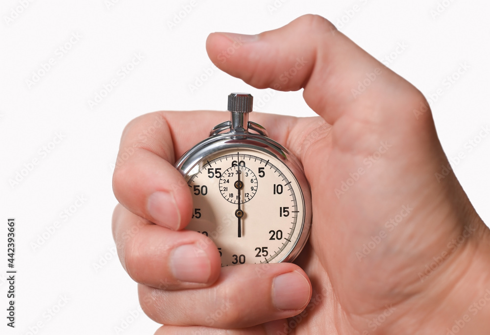 Stopwatch in hand, finger presses a button, start, finish, isolate, close-up Stopwatch in hand, finger presses a button, start, finish, isolate, close-up