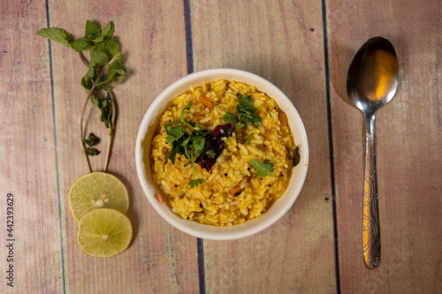 South indian tasty sambar rice with coriander photo