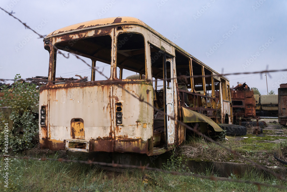 Old rusty bus, Buryakovka radioactive vehicles graveyard Old rusty bus, Buryakovka radioactive vehicles graveyard