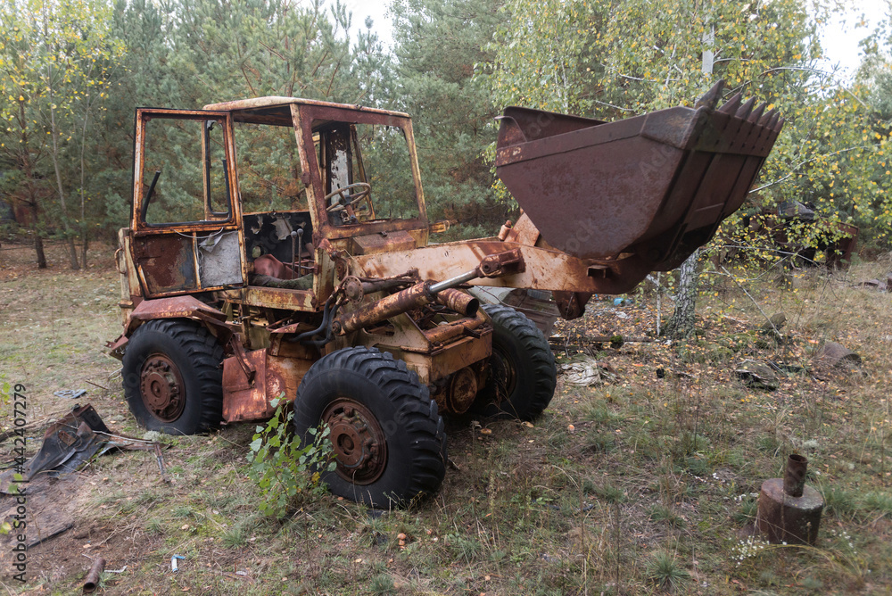 Old abandoned bulldozer, radioactive vehicle near ghost town Pripyat Old abandoned bulldozer, radioactive vehicle near ghost town Pripyat