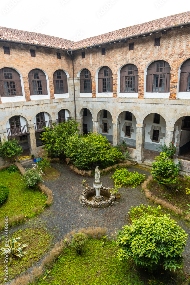 Patio seen from above of the Santa Clara Monastery in the town of Azkoitia next to the Urola river. Founded by Don Pedro de Zuazola, Gipuzkoa. Basque Country Patio seen from above of the Santa Clara Monastery in the town of Azkoitia next to the Urola river. Founded by Don Pedro de Zuazola, Gipuzkoa. Basque Country