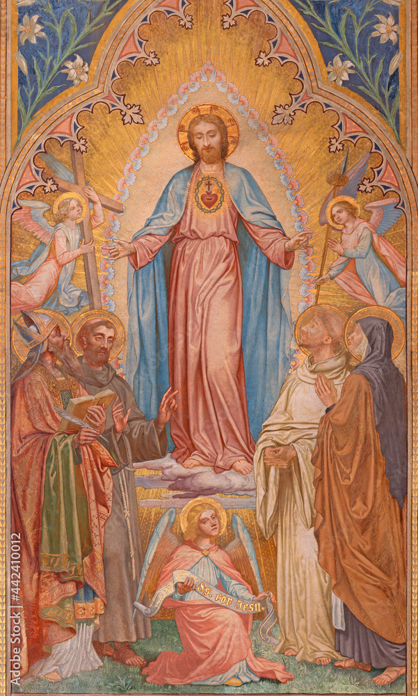 VIENNA, AUSTIRA - JUNI 24, 2021: The fresco of heart Jesus among the saints in the Votivkirche church by brothers Carl and Franz Jobst (sc. half of 19. cent.).
