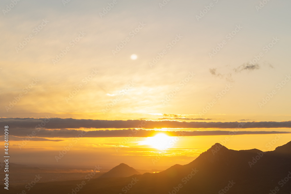 Fototapeta premium Mountain Landscape. Panoramic View Of Mountains Against Sky During Sunset