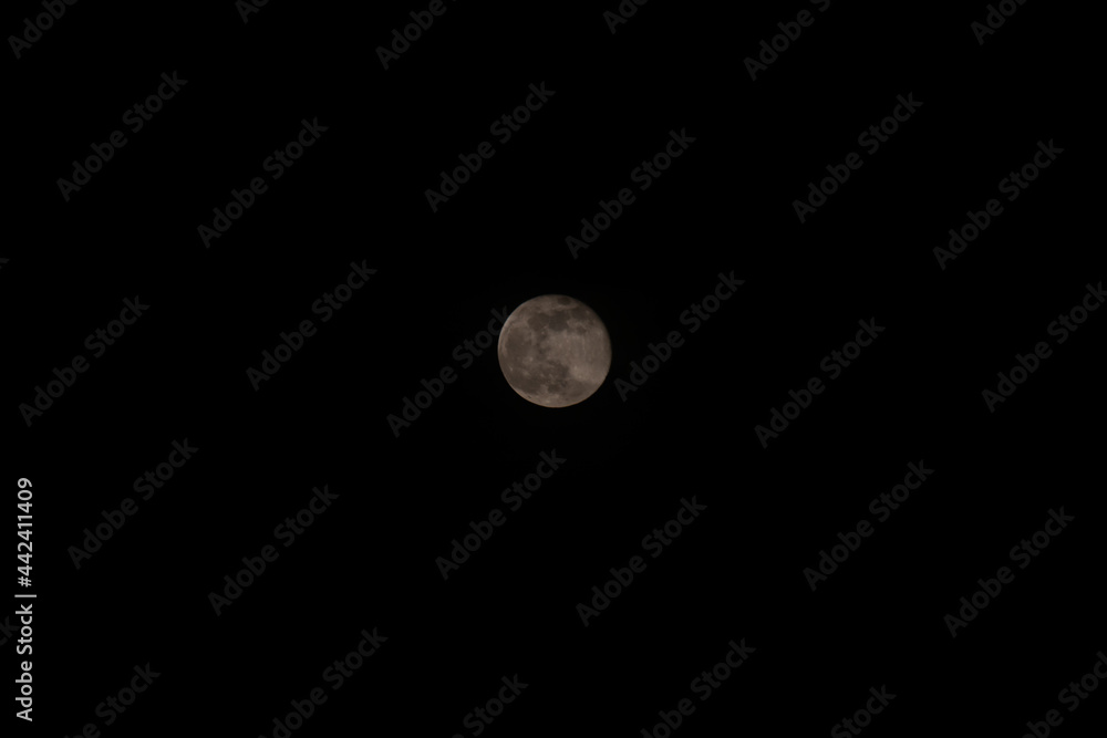 Full moon close up on black background Full moon close up on black background