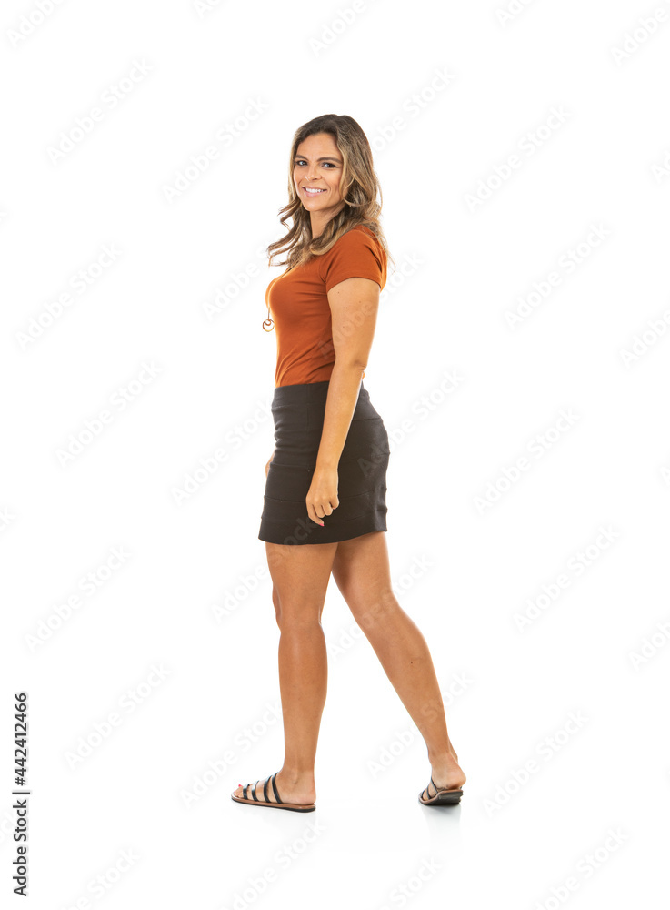 Businesswoman Twists To Look Over Shoulder Businesswoman Twists To Look Over Shoulder