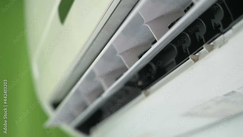 Adjusting air conditioner at home in 4K Slow motion 60fps Adjusting air conditioner at home in 4K Slow motion 60fps