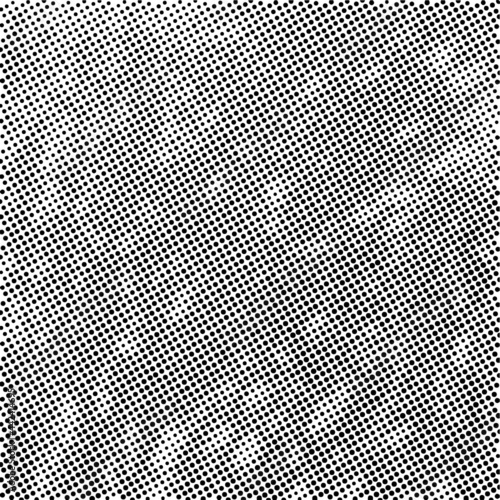 Black halftone dotted grunge background. Trendy distress dirty design element. Overlay dots texture. Grungy style