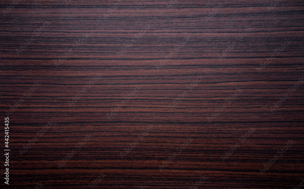 The texture of dark mahogany in a retro style for the manufacture of furniture and interior items The texture of dark mahogany in a retro style for the manufacture of furniture and interior items