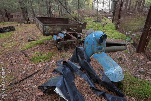 Abandoned radioactive vehicle, old rusty motorcycyle