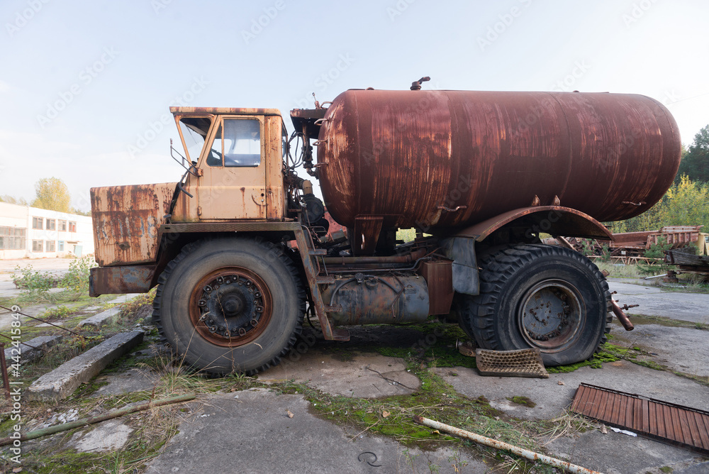 Old rusty truck near ghost town Pripyat