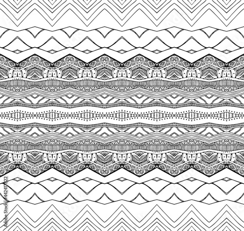 Black and white ornament in ethnic style. Seamless pattern with monochrome tracery.