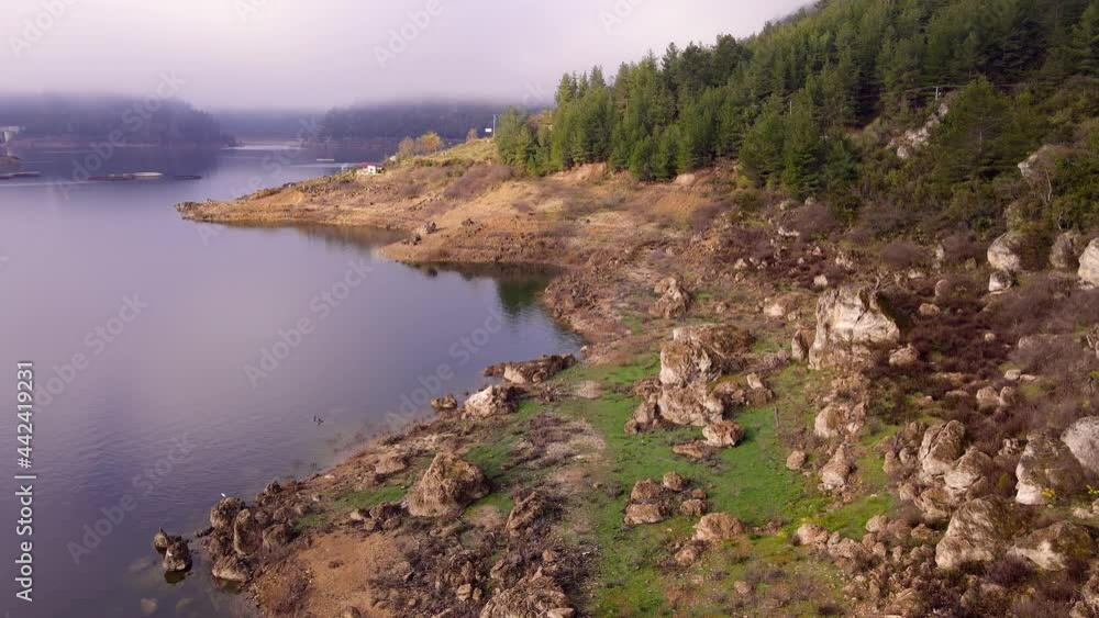 Aerial view of shore of Karacaoren Lake in Antalya province, Turkey. Tourism lake for fishing of trout Aerial view of shore of Karacaoren Lake in Antalya province, Turkey. Tourism lake for fishing of trout