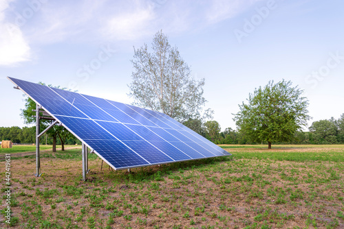 Solar panels mounted on the ground.