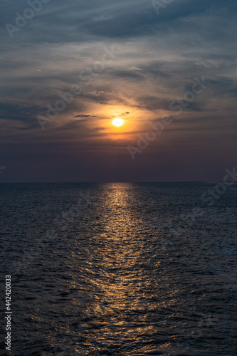 sunset over the ocean. sunset landscape. The reflection of the sun on the ocean during the summer.