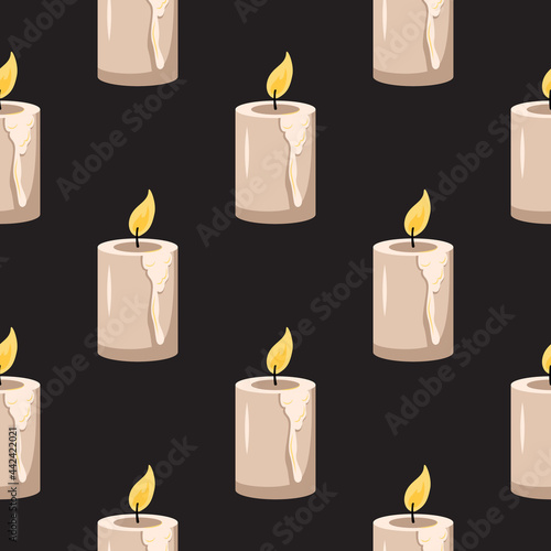Seamless pattern with candles on a black background. Halloween print and party decoration