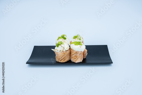 Japanese food on black dish with white background