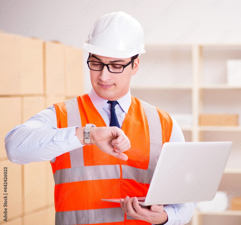 Man working in postal parcel delivery service office Man working in postal parcel delivery service office