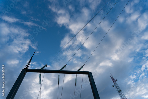 Wallpaper Mural Electrical vires on a blue sky with white clouds Torontodigital.ca