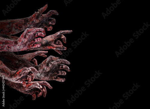 zombies or monsters hand attacking, attack or nightmare concept, isolated black background