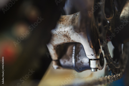 A crack in the carbon frame of a mountain bike. Repairing is definitely possible but it is a complicated process - one best performed by people with experience, knowledge and the correct tools.