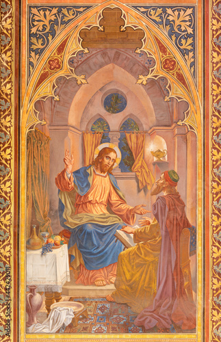 VIENNA, AUSTIRA - JUNI 24, 2021: The fresco Conversation between Nicodemus and Jesus in the Votivkirche church by brothers Carl and Franz Jobst (sc. half of 19. cent.). photo