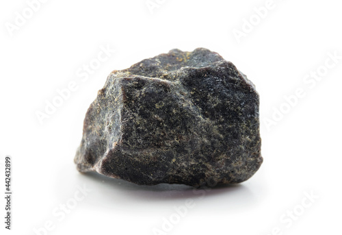 Kala namak. Also called as Himalayan black rock salt (Sulemani namak, bit lobon, kala noon, pada loon) . chunk of Himalayan black rock salt isolated on white.  Known for sulphurous, pungent smell.