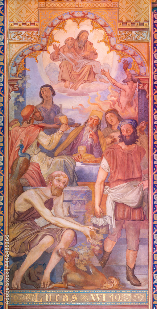 VIENNA, AUSTIRA - JUNI 24, 2021: The fresco of the parable of rich man and Lazarus in the Votivkirche church by brothers Carl and Franz Jobst (sc. half of 19. cent.).