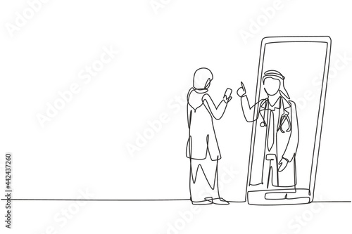 Continuous one line drawing hijab female patient holding smartphone standing facing giant smartphone and consulting male doctor. Doctor online. Single line draw design vector graphic illustration