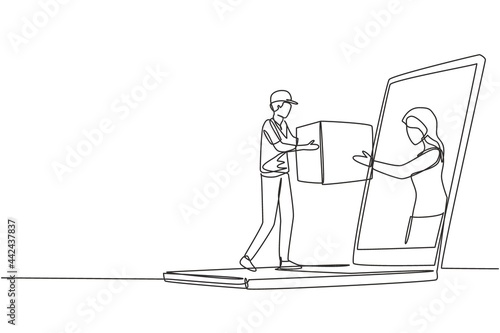 Continuous one line drawing female customer receives boxed package, through laptop screen from male courier. Online delivery service concept. Single line draw design vector graphic illustration