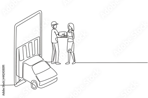Continuous one line drawing delivery box car comes out partly from giant smartphone screen and male courier gives package box to female customer. Single line draw design vector graphic illustration