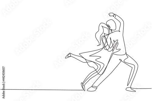 Single one line drawing man and woman performing dance at school, studio, party. Male and female characters dancing tango at night club. Modern continuous line draw design graphic vector illustration