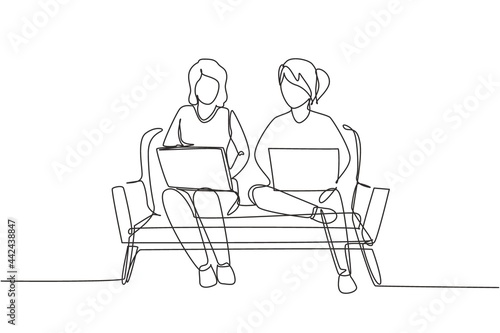 Continuous one line drawing two woman with laptop sitting on the sofa together. Freelance, distance learning, online courses, and studying concept. Single line draw design vector graphic illustration