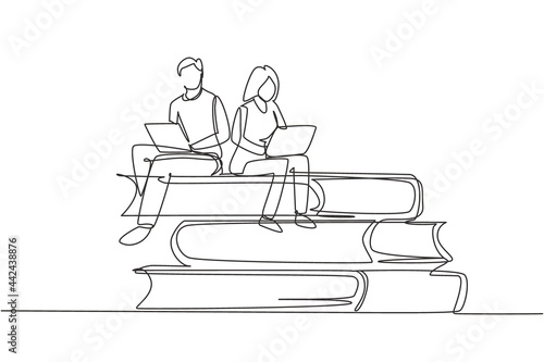 Continuous one line drawing couple with laptop sitting on pile of books together. Freelance, distance learning, online courses, studying concept. Single line draw design vector graphic illustration