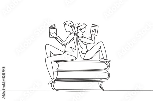 Single one line drawing students woman and man reading, learning and sitting on big books. Study in library. Literature fans or lovers. Modern continuous line draw design graphic vector illustration photo